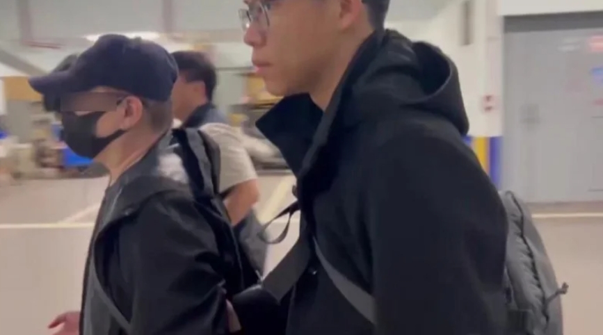 ▲全國最大虛擬貨幣實體店面交易所幣想科技公司，被控替詐騙集團洗錢向999人騙走17億元，刑事局查獲施姓負責人等12人，包括負責收幣的台北市信義店長王姓男子（左）。聯合報記者李奕昕翻攝。