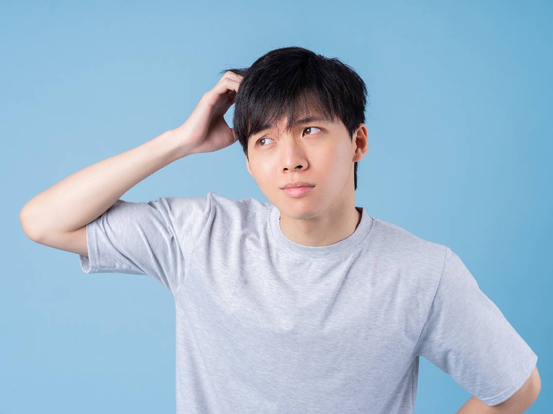 young man confused