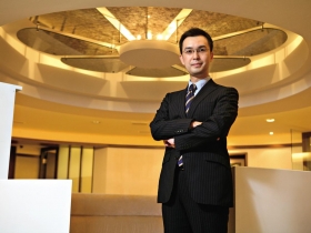 銀行員穩健布局 10年買兩房、存千萬