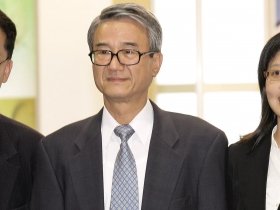 新光金股價急拉  吳東進親家出手相救？