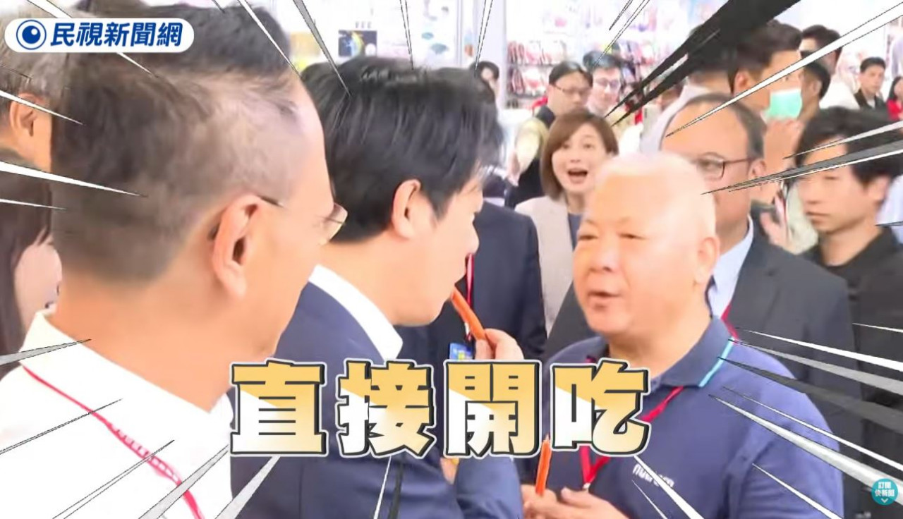 賴清德寵物展吃肉乾