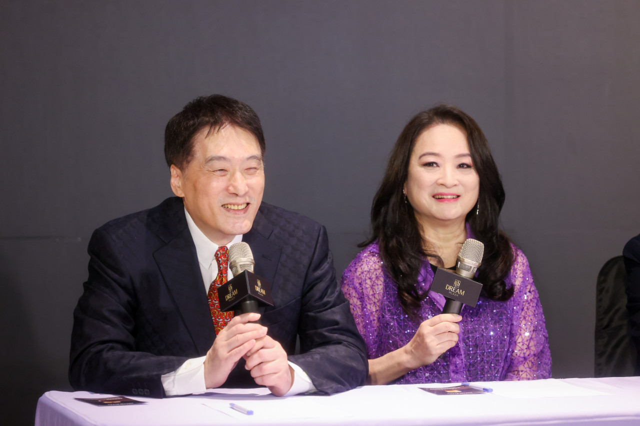 高秀玲,羅智先